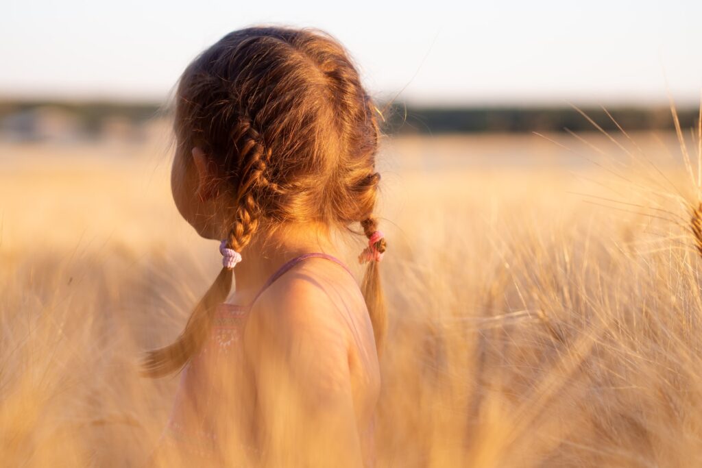 young girl looking back