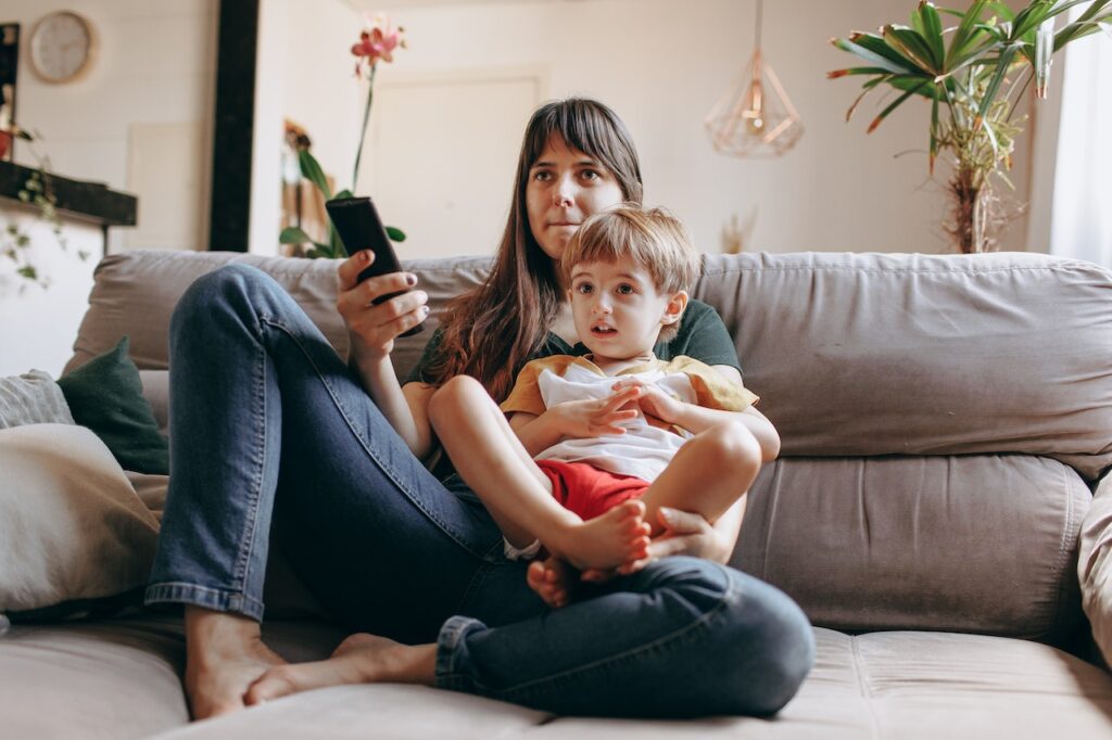 mother and son watching tv